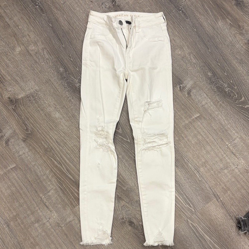 American Eagle Outfitters High Rise White Distressed Skinny Jeans